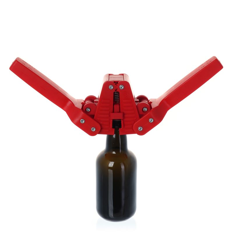 Apparecchio per chiusura con capsula corona da 26 mm Apparecchio per chiusura con capsula corona da 26 mm